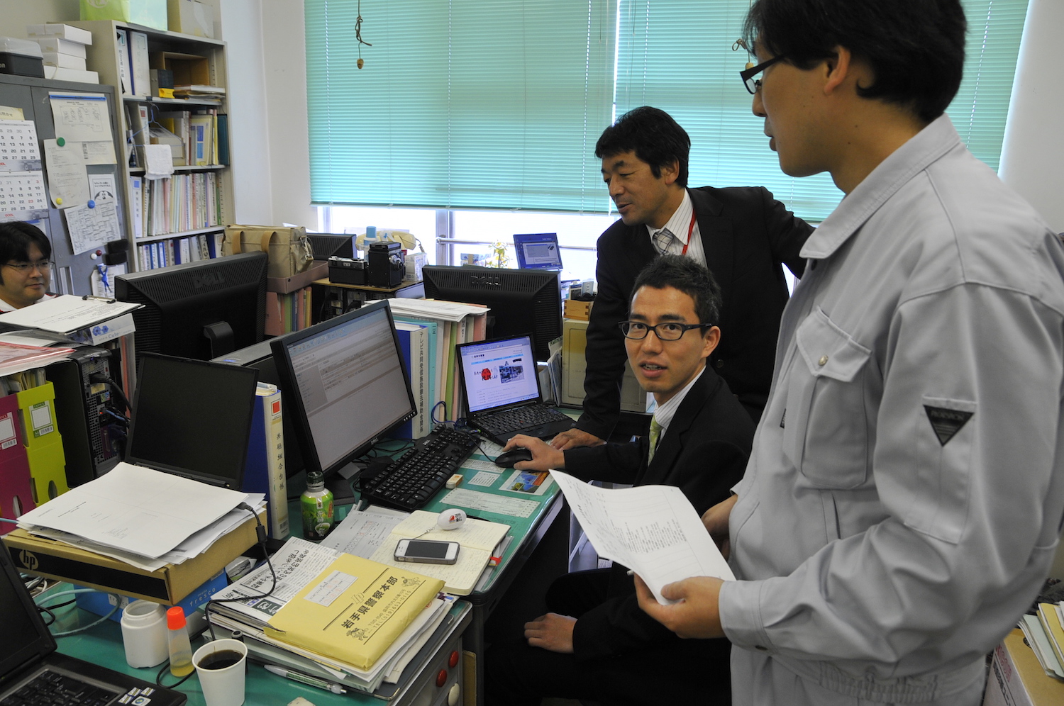 釜石市出向時の先輩、阿部主任(当時)(写真右)と石黒さん